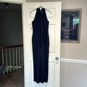 Vince Camuto wide leg, navy blue jumpsuit with pockets.